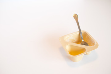 Empty yogurt container