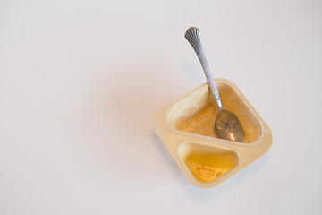 Empty yogurt container