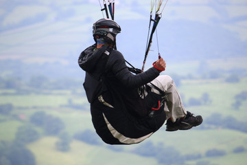 Paraglider in harness