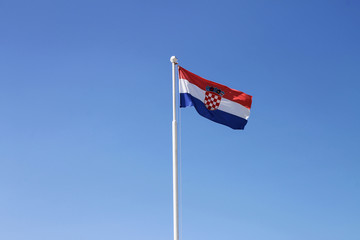 Flag of Croatia with blue sky in background