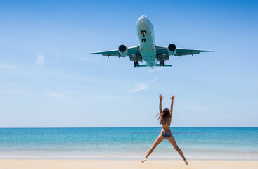 Travel concept. Young woman in flight