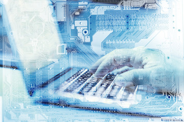 Virtual computer technology. Motherboard and a computer in a double exposure.