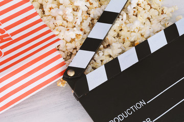Tasty popcorn and clapboard