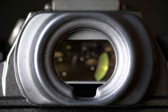Camera's viewfinder on black background.