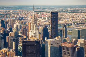 New York City Manhattan street aerial view with skyscrapers. Skyscrapers New York. Skyscrapers aerial. Skyscrapers in New York at sunset.