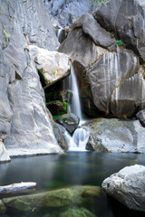 Fototapeta na wymiar Long Exposure Waterfall at the bottom of Bridal veil Falls in Yosemite