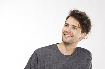 Smiling positive male with attractive look, wearing T-shirt