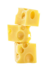 Cheese cube slices isolated on a white background