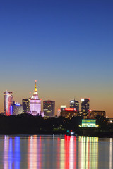 Warsaw skyline at night vertical - obrazy, fototapety, plakaty