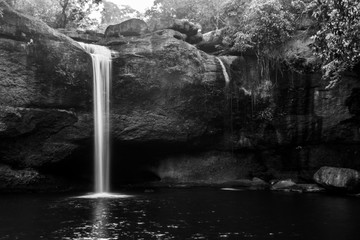 Beautiful waterfall with sunlight in jungle, Haew Suwat Waterfall. black and white shot