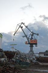 Scrap metal crane in an inland port in Germany