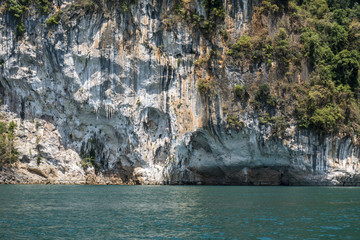 High epic limestone cliffs at Cheow Lan lake, Khao Sok National Park, Suratthani, Thailand.