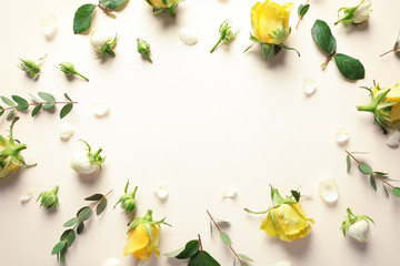 Flat lay composition with beautiful blooming flowers on color background