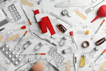 Many different medical objects on marble background, flat lay