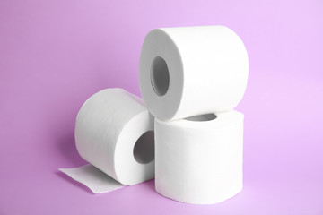 Toilet paper rolls on color background. Personal hygiene