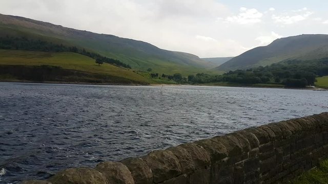 Footage of Dovestone Reservoir with a wind surfer.