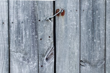old rustic wooden door with latch locks wooden background for safety security related concept background
