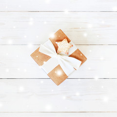 Natural white wooden background with gift box