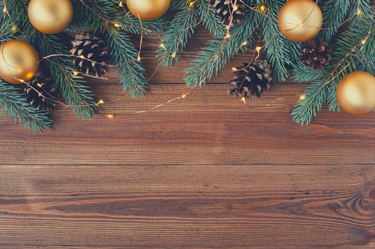 Brown wooden background with festive Christmas decoration