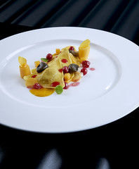Ravioli pasta on a black background