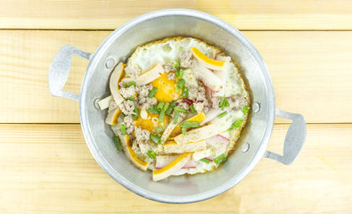 Breakfast panned egg on a white wood floor table, Top view, Copy space.