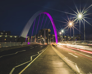 Fototapeta na wymiar Light trails through the Clyde Arc Squinty Bridge in Glasgow