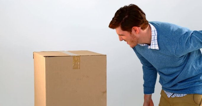 Courier man picking up cardboard boxes 4k