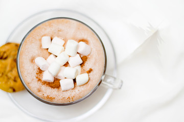 Christmas and new year card with cup of cacao hot chocolate with marshmallow and gingerbread cookies. top view. copyspace - holidays, winter, celebration and good morning concept
