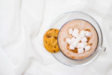 Christmas and new year card with cup of cacao hot chocolate with marshmallow and gingerbread cookies. top view. copyspace - holidays, winter, celebration and good morning concept