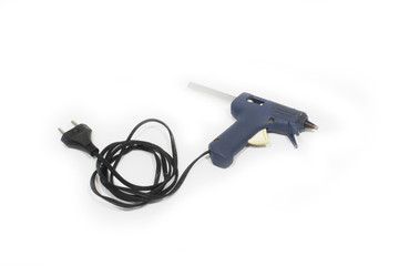 Electric hot glue gun isolated on white