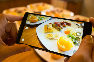 taking photo of breakfast