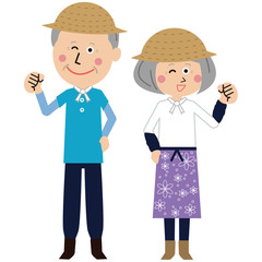 ポップな農家のシニアの男女がガッツポーズ