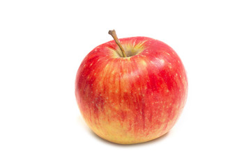Red apple on a white background. Side view. Close-up