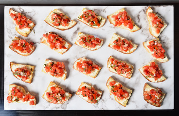 Toast with salsa sauce on buffet table