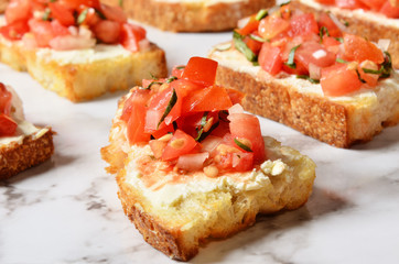 Toast with salsa sauce on buffet table
