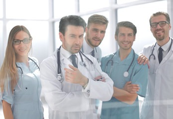 group of doctors standing in the meeting room