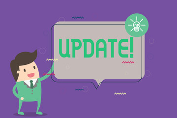 Conceptual hand writing showing UPDATE. Business photo showcasing Make something more modern Adding new facts Changing its design.