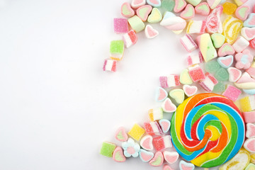 Creative arrangements of confectionery or candies on a white background. Flat lay.