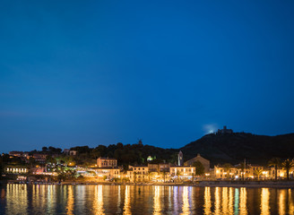Fototapeta na wymiar Beautiful coast of Colliure village at night, Languedoc Roussillon, Oriental Pyrinees. Collioure is a coastal village in the south of France.