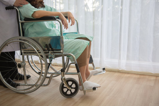 The doctor is taking care of the patient Disabled women is wheelchair in hospital.rehabilitation concept