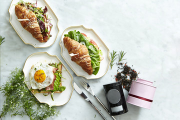 Bacon and avocado toast with croissant sandwich 