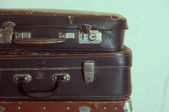 Vintage outdated leather travel suitcases