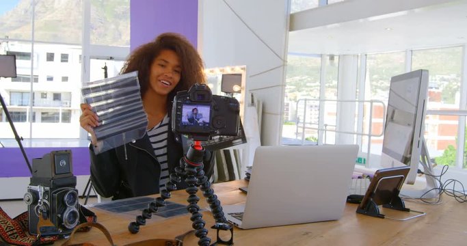 Model recording her video in photo studio 4k