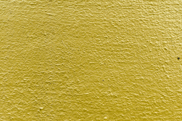 Gold concrete wall texture for background and wallpaper