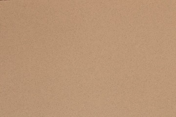 Fototapeta na wymiar The texture of the grey cardboard. Abstract grey background