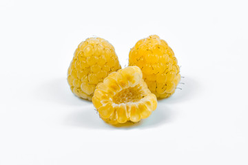 Set of yellow raspberry berry fruits on white background.