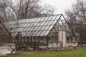 The building of two abandoned and destroyed glass greenhouses