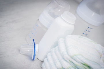 Diapers, talc powder, milk bottle