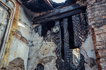 Inside burnt house. Consequences of fire