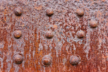 Old riveted metal wall surface
